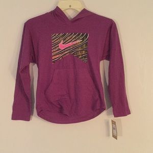 Nike long sleeve shirt with hood and pocket.